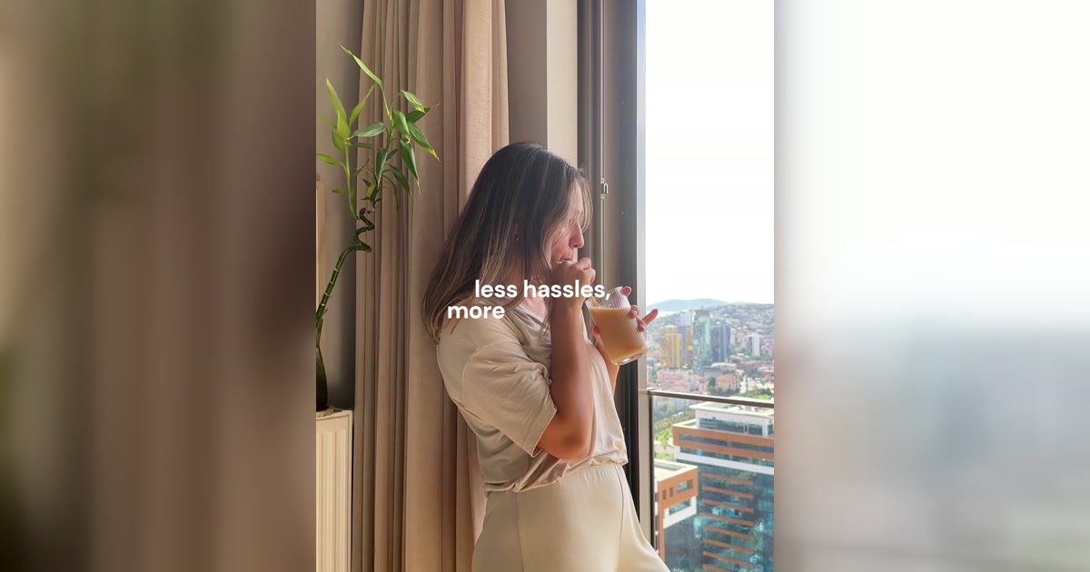 Creator by a window with the words less hassles, more brand