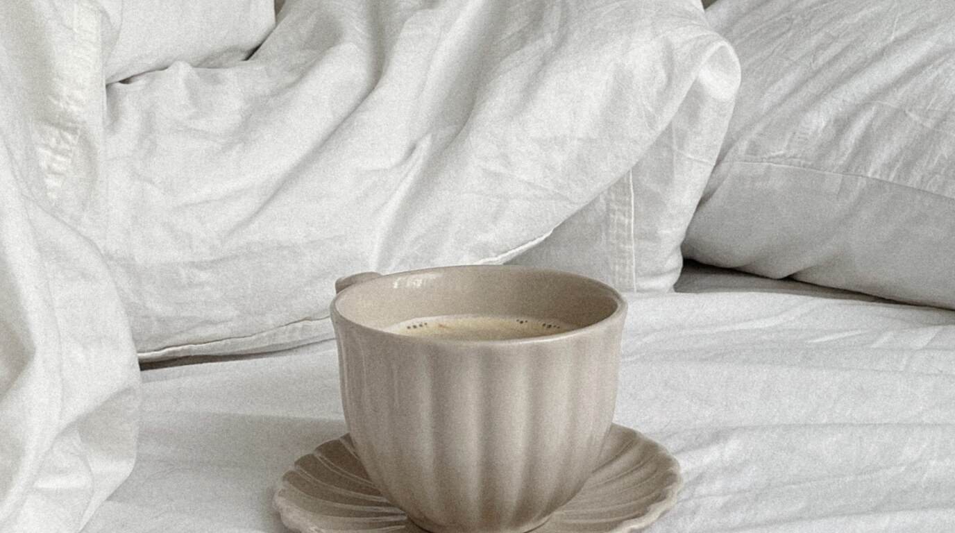 Unmade bed and coffee with the words LLC Formation without leaving bed